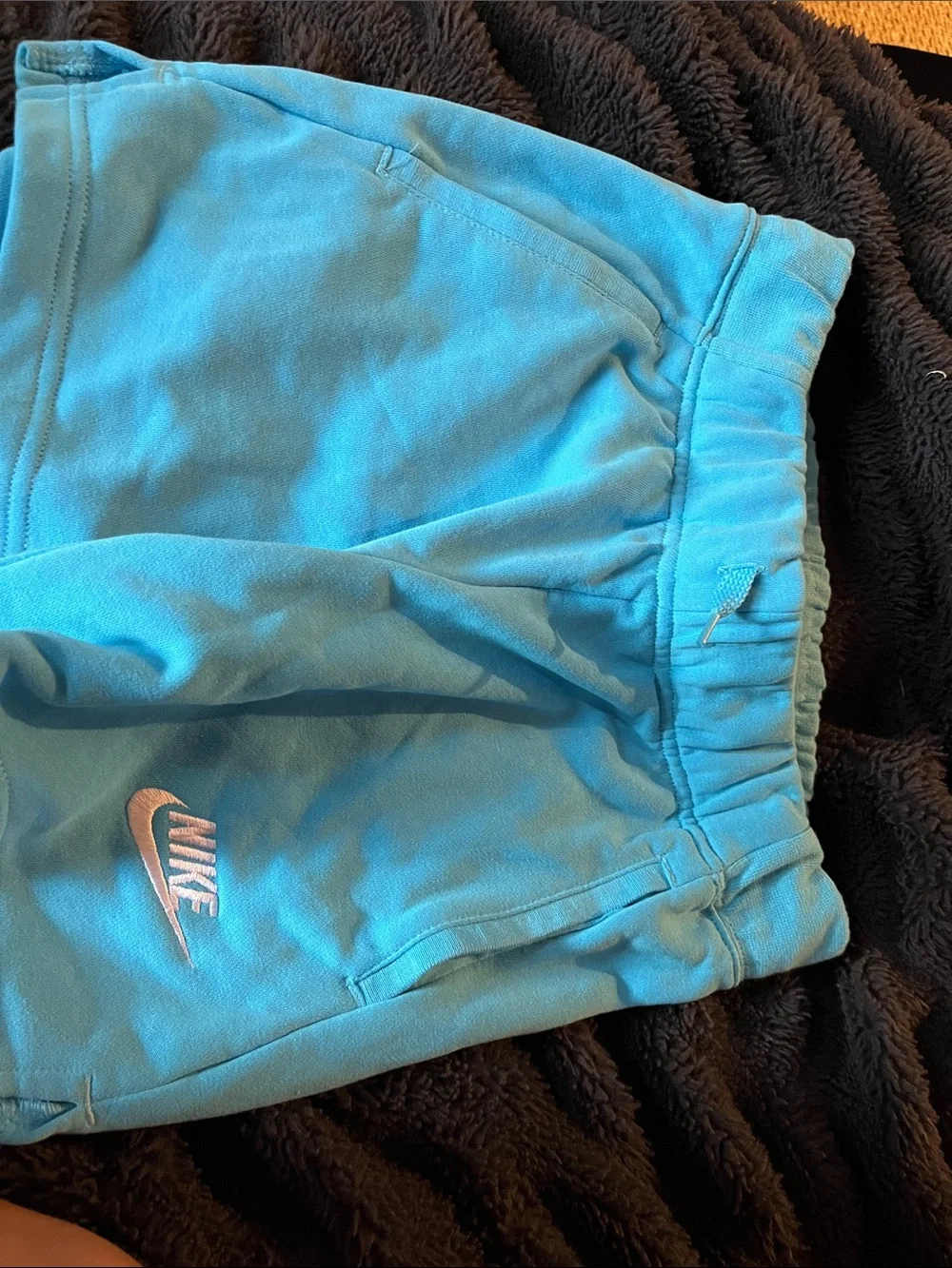 Nike Light Blue Shorts with Pink Swoosh Logo